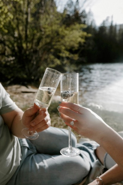 Romantic Buena Vista, Colorado engagement photo with a couple sharing a quiet moment by the lake.